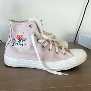 Pink converse with embroidery detail